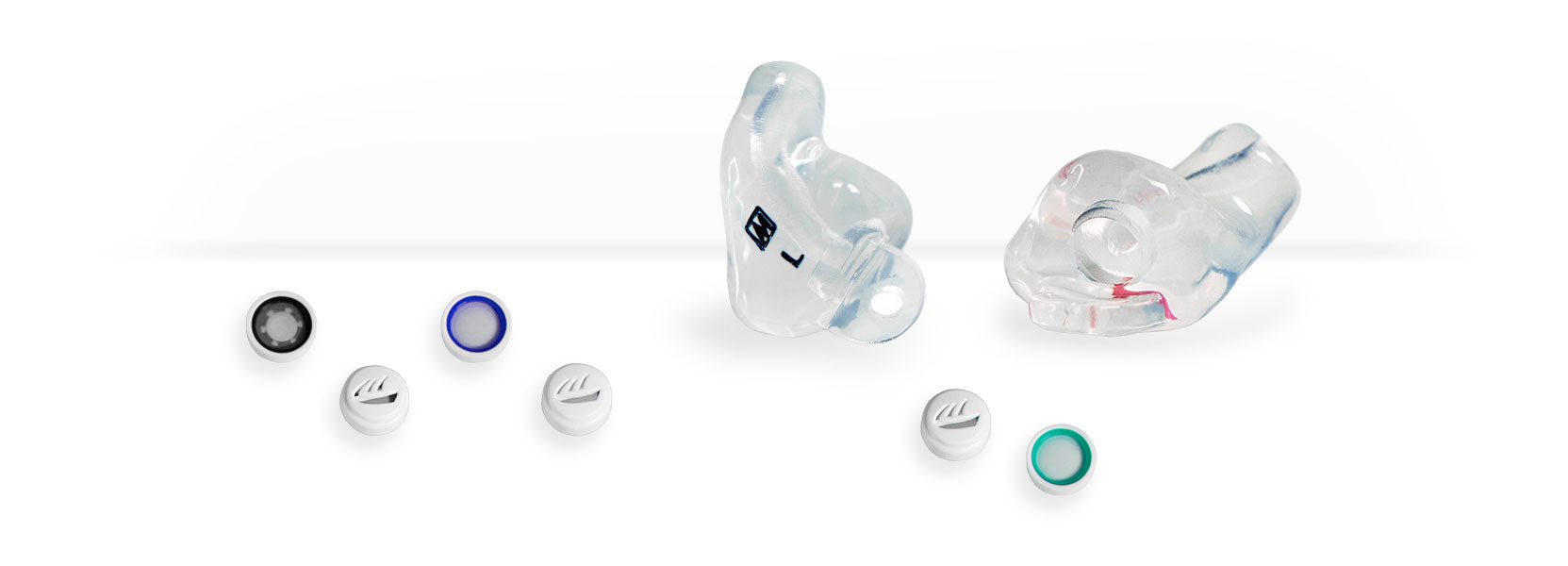Clear custom earplugs with a variety of interchangeable flat response filters 